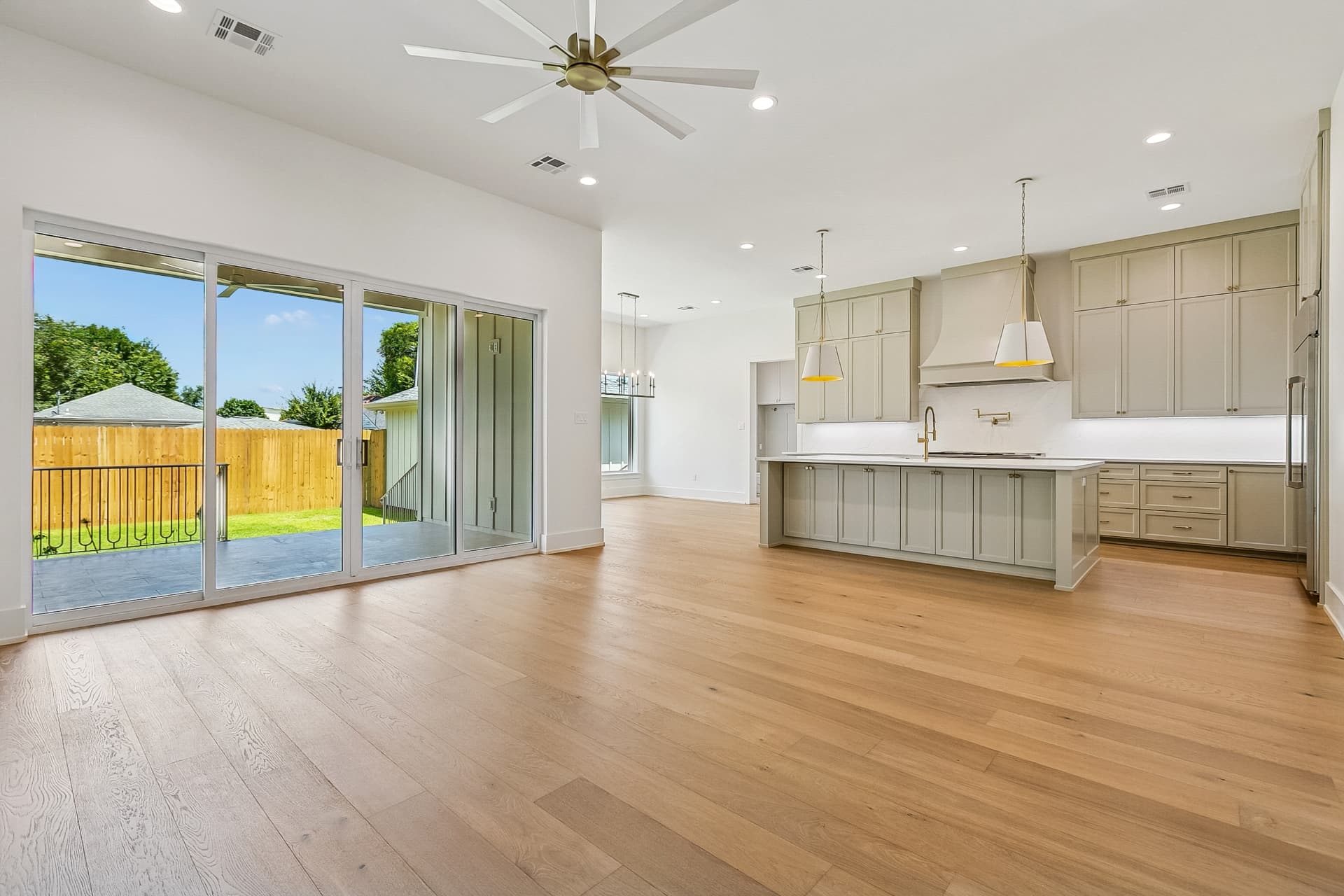 Open-concept living area with sliding glass doors